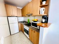 Kuchnia lub aneks kuchenny w obiekcie Apartamentos Sa Tenassa