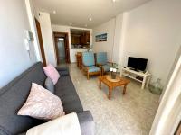Telewizja i/lub zestaw kina domowego w obiekcie Apartamentos Sa Tenassa