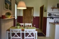 Kuchyň nebo kuchyňský kout v ubytování Ferienwohnung OG im roten Haus am Ostsee Radweg OVS 103