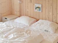 Postel nebo postele na pokoji v ubytování 10 person holiday home in Idestrup