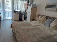Łóżko lub łóżka w pokoju w obiekcie Appartement Daniel Kaprun