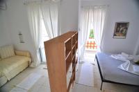 Posteľ alebo postele v izbe v ubytovaní Zennova #16 Naftilos Family Summer House