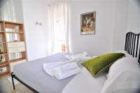 Posteľ alebo postele v izbe v ubytovaní Zennova #16 Naftilos Family Summer House
