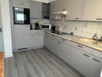 Kuchnia lub aneks kuchenny w obiekcie Maison idéalement située pour les vacances