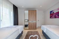 Postel nebo postele na pokoji v ubytování Belek Deluxe Suit