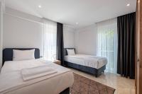 Postel nebo postele na pokoji v ubytování Belek Deluxe Suit