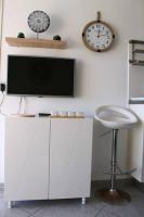 Telewizja i/lub zestaw kina domowego w obiekcie T1 Cabine 4 couchages vue mer !