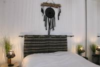 Łóżko lub łóżka w pokoju w obiekcie T1 Cabine 4 couchages vue mer !