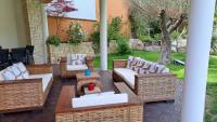 Część wypoczynkowa w obiekcie VILLA PALMIER avec PISCINE CHAUFFÉE PRIVÉE proche D'UZES ET ANDUZE