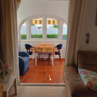 Posezení v ubytování Villa totalmente independiente con piscina comunitaria