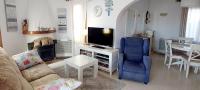 TV a/nebo společenská místnost v ubytování Villa totalmente independiente con piscina comunitaria
