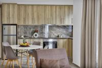 Kuchnia lub aneks kuchenny w obiekcie Semes Luxury Apts by Estia