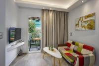 Telewizja i/lub zestaw kina domowego w obiekcie Semes Luxury Apts by Estia