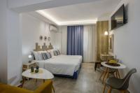 Łóżko lub łóżka w pokoju w obiekcie Semes Luxury Apts by Estia