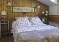 Postel nebo postele na pokoji v ubytování San Marsial Benasque Apart Hotel