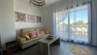 Posedenie v ubytovaní Sunny Luxury Apartment with two great sunny - level terraces, two swimming pools, in a new complex Pueblo Majorero, close to Fuerteventura Golf Club, next to the beach , Atlantico Shopping Mall and casino in Caleta de Fuste