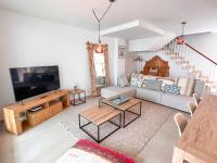 TV a/nebo společenská místnost v ubytování Tarifa Cozy House - La Casita del Recreo