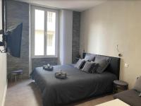 Łóżko lub łóżka w pokoju w obiekcie PACA Properties 41H2 - Studio cosy