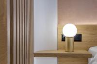 Posteľ alebo postele v izbe v ubytovaní Acropolis Magenta Luxury Suites