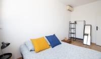 Łóżko lub łóżka w pokoju w obiekcie *Le Cosy* 3 chambres hypercentre - Parking - Wifi