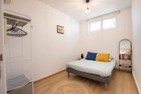 Łóżko lub łóżka w pokoju w obiekcie *Le Cosy* 3 chambres hypercentre - Parking - Wifi