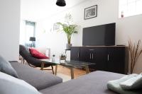 Telewizja i/lub zestaw kina domowego w obiekcie *Le Cosy* 3 chambres hypercentre - Parking - Wifi