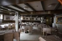 Reštaurácia alebo iné gastronomické zariadenie v ubytovaní Hotel Nevada