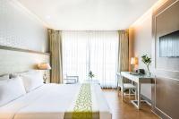 Postel nebo postele na pokoji v ubytování Best Western Patong Beach