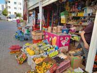 Et supermarked eller andre butikker i lejligheden eller i nærheden