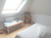 Łóżko lub łóżka w pokoju w obiekcie Dom & ses chambres d'hôtes