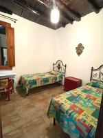 Posteľ alebo postele v izbe v ubytovaní TROPEA center - unique sea VIEW - Casa dei Coralli