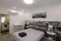 A bed or beds in a room at Suite estocolmo