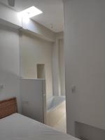 Posteľ alebo postele v izbe v ubytovaní White cycladic town house with sea vew