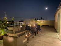 A balcony or terrace at Luxury Penthouse with Stunning View and Hammam
