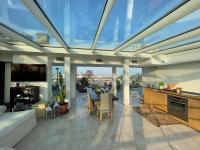 A television and/or entertainment centre at Luxury Penthouse with Stunning View and Hammam