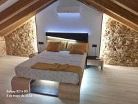 Posteľ alebo postele v izbe v ubytovaní Casa Grilo
