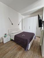 A bed or beds in a room at Amiura B&B