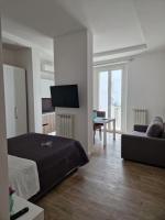 A television and/or entertainment centre at Amiura B&B