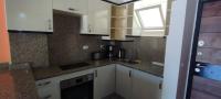 Kuchyň nebo kuchyňský kout v ubytování 2 bedroom flat in Makadi