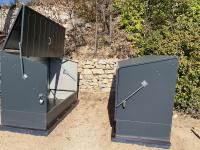 two metal boxes sitting next to each other at Manoir d&#39;Amaury - Chambres d&#39;hôtes in Gréoux-les-Bains