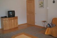 Telewizja i/lub zestaw kina domowego w obiekcie Ferienwohnung Mützengruß
