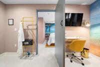 Wanderstay Boutique Hotelにあるテレビまたはエンターテインメントセンター