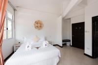 Postel nebo postele na pokoji v ubytování Twin Villas Ao Nang