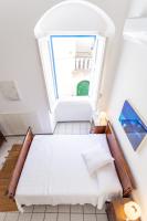 Posteľ alebo postele v izbe v ubytovaní Il balconcino di Otranto - centro storico