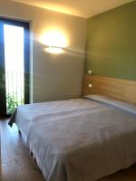 Postel nebo postele na pokoji v ubytování Agriturismo Forest B&B