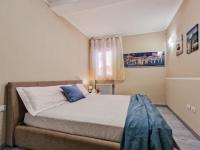 Postel nebo postele na pokoji v ubytování Villa Galatea Exclusive