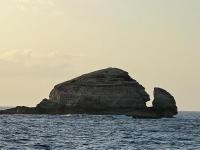 a large rock in the middle of the ocean at Yeux D&#39;azur in Le Souffleur