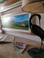 A television and/or entertainment centre at B&B La Casa di Zia Lina