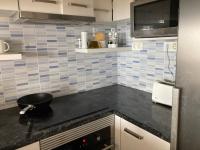 Kuchyň nebo kuchyňský kout v ubytování Apartamento 1ª linea de mar