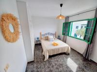 Postel nebo postele na pokoji v ubytování Casa Yaya